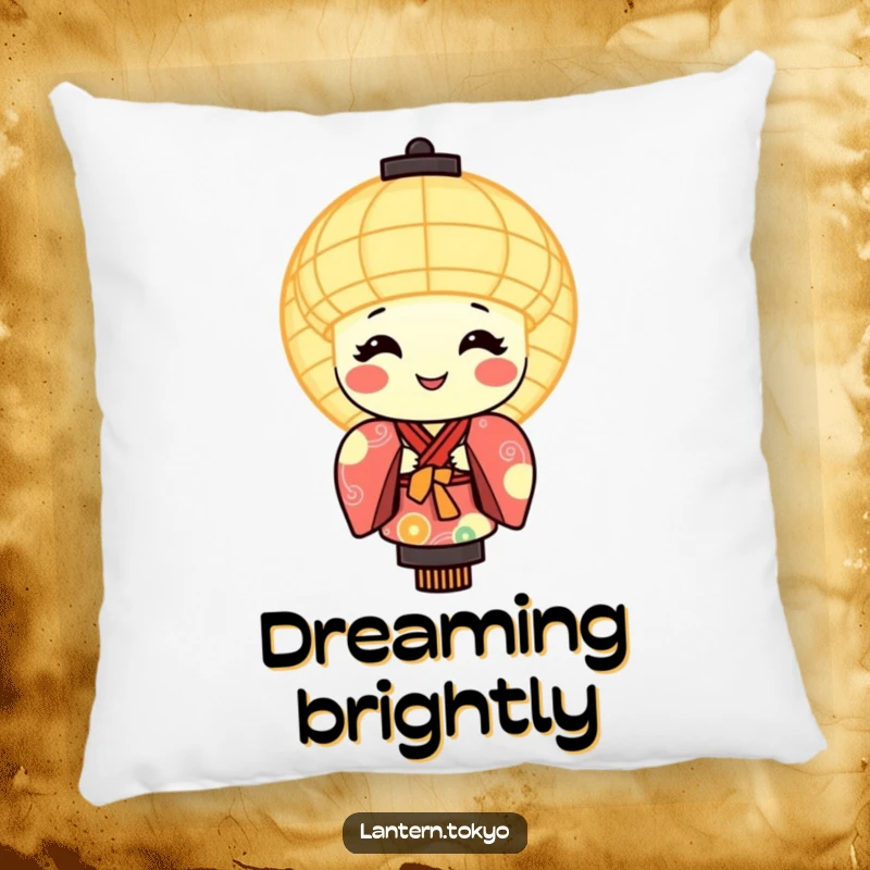Funny pillow showing a round, smiling, glowing lantern character dressed in a colorful kimono.